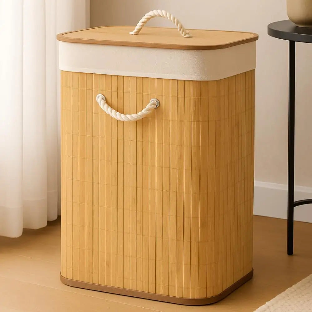 Bamboo laundry hamper with lid in a bedroom